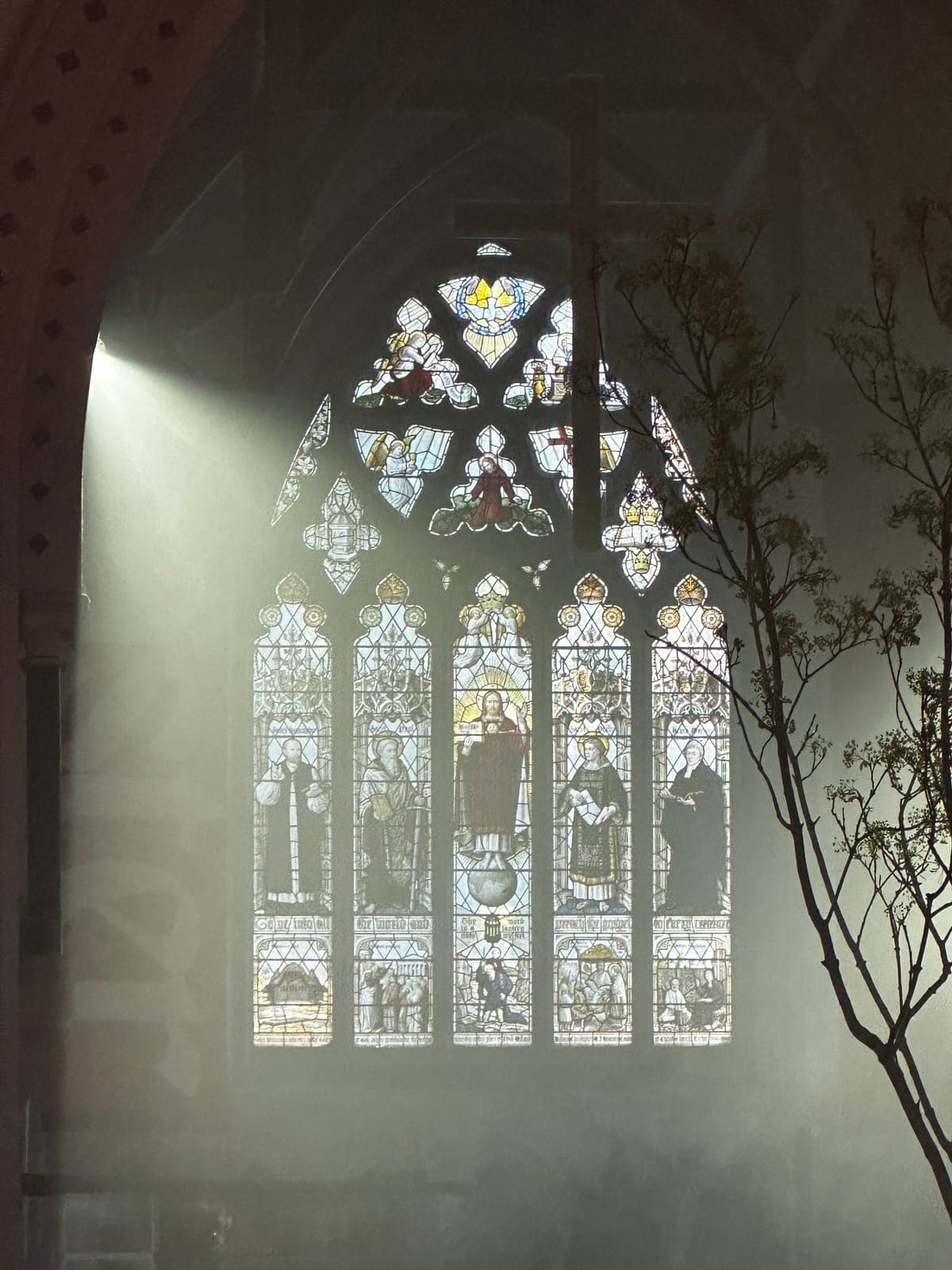 Light shining through a stained glass window